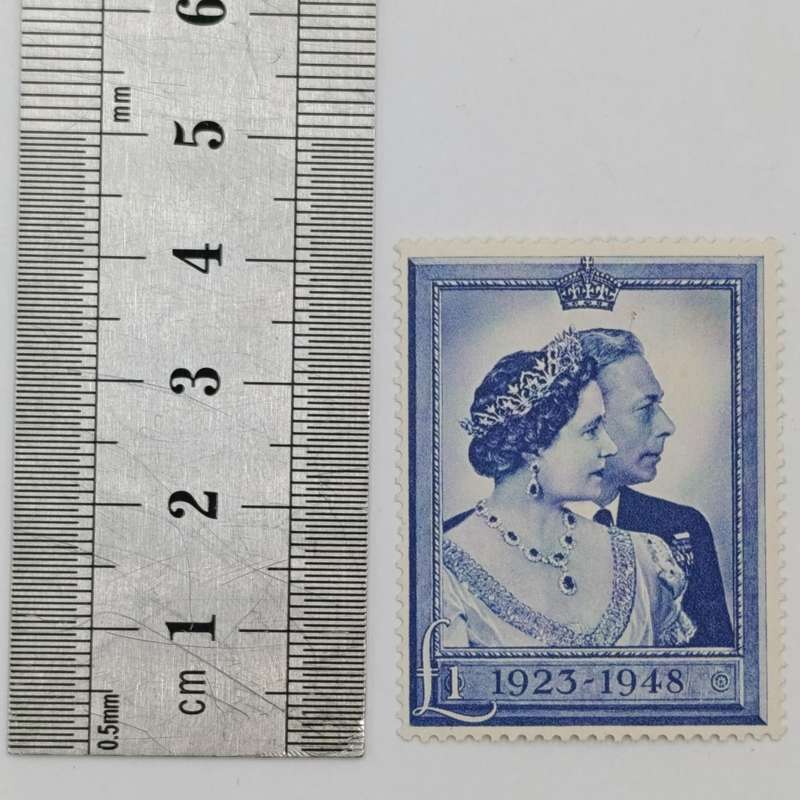 Great Britain Royal silver wedding 1 pound mint hinged stamp plus used stamp