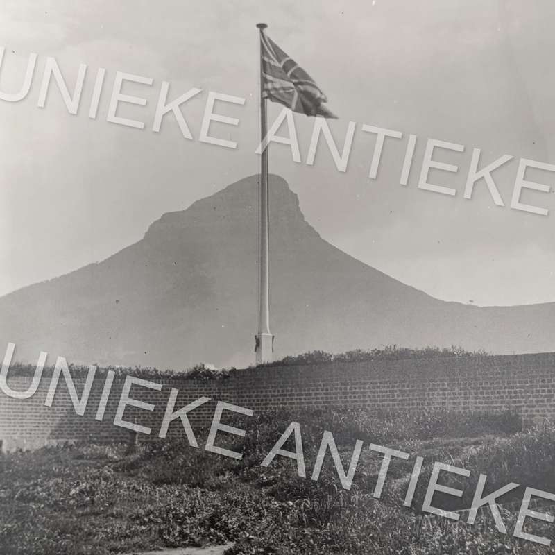 Antique photo reprint of Union Jack flag with Lion's Head in back