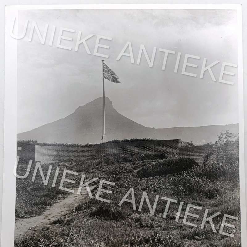 Antique photo reprint of Union Jack flag with Lion's Head in back