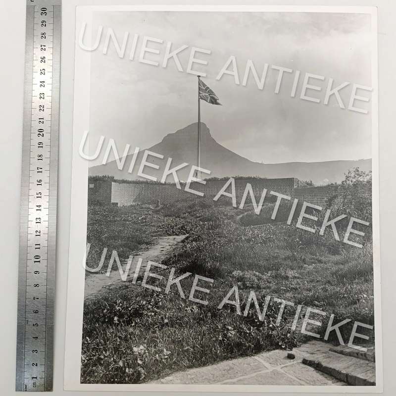 Antique photo reprint of Union Jack flag with Lion's Head in back