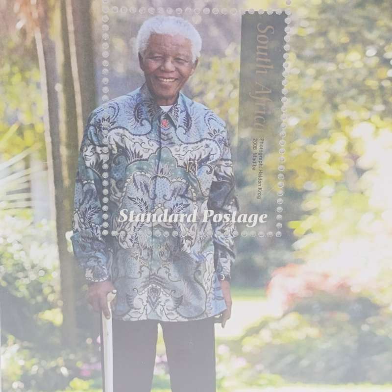 Nelson Rolihlahla Mandela souvenir album with stamps, phonecards, postal covers etc