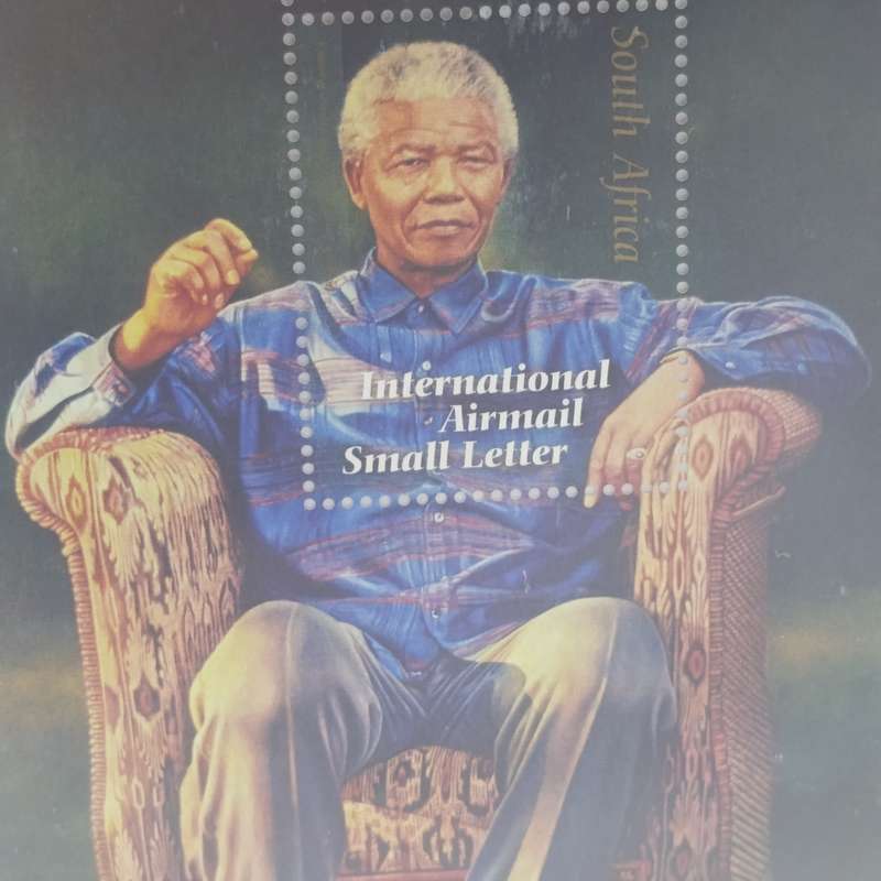 Nelson Rolihlahla Mandela souvenir album with stamps, phonecards, postal covers etc