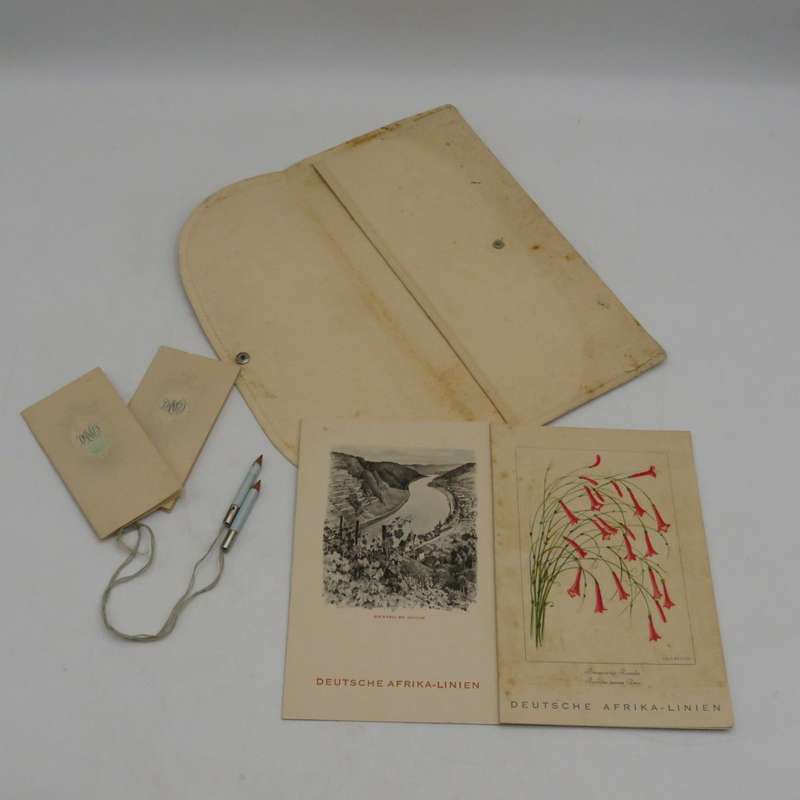 Vintage Deutsche Afrika-Linien document pouch with two menus and two notebooks with pencils for ship