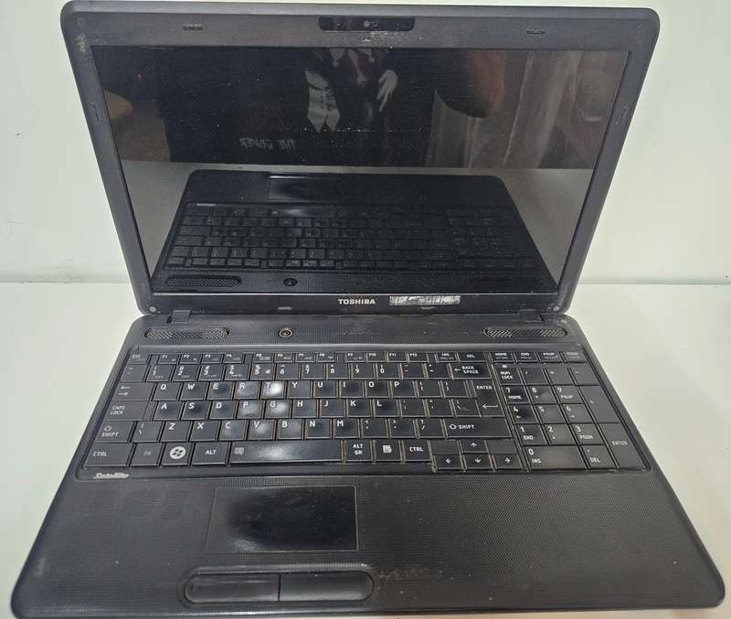 Toshiba Satellite C660-211  Dead Laptop  Battery Included  Sold As Is