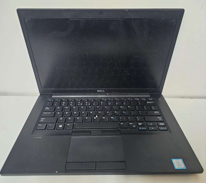 Dell Latitude slimline business laptop  for spares or repairs, dead, no power, no hdd or ram