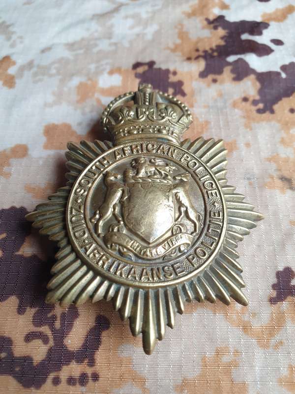 scarce (unmolested - often the crown was removed) SA POLICE (large) Pith Helmet type metal badge