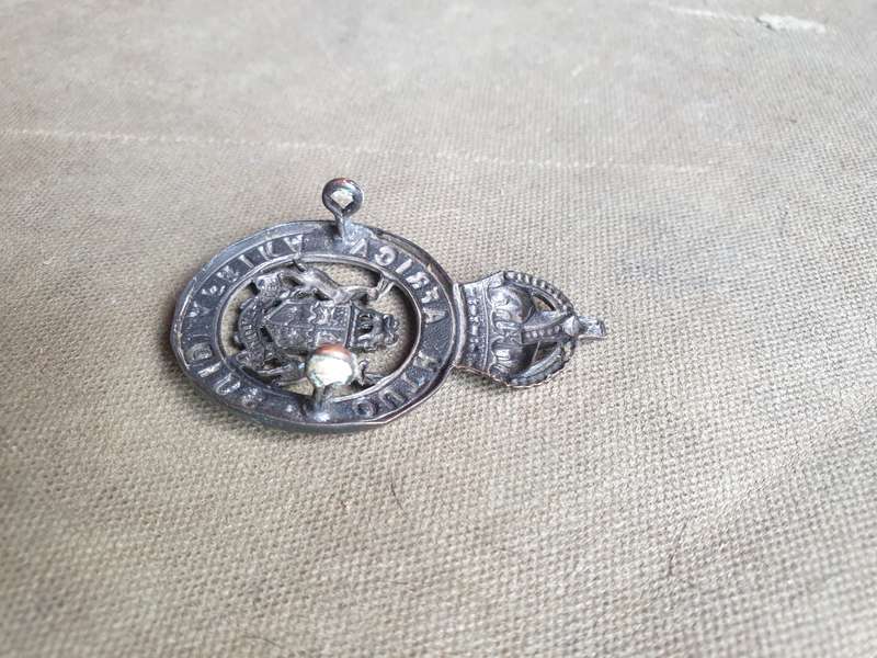 scarce WW2 era South African Instructors Corps metal cap badge - with both rear lugs intact