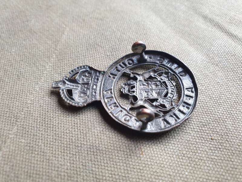 scarce WW2 era South African Instructors Corps metal cap badge - with both rear lugs intact