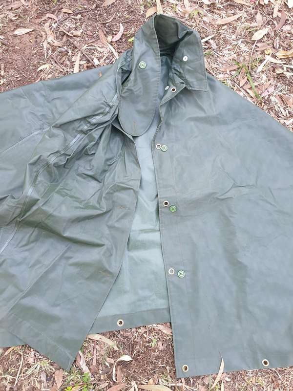 as new & unused Rhodesian era Army issue heavy duty PVC/vinyl olive green capes' gas very good cond.