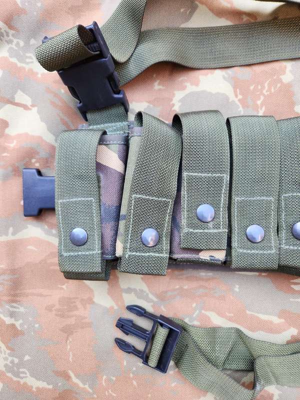 as new & unused scarce & rarely seen UK MoD 40mm ammo bandolier carrier (chest webbing type) in DPM