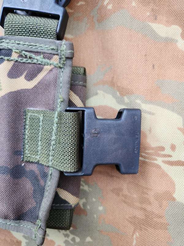 as new & unused scarce & rarely seen UK MoD 40mm ammo bandolier carrier (chest webbing type) in DPM