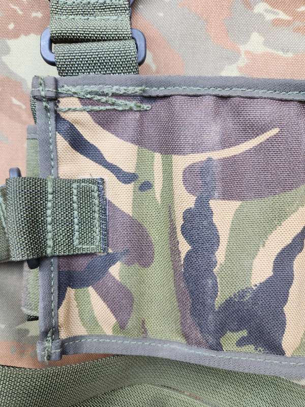 as new & unused scarce & rarely seen UK MoD 40mm ammo bandolier carrier (chest webbing type) in DPM