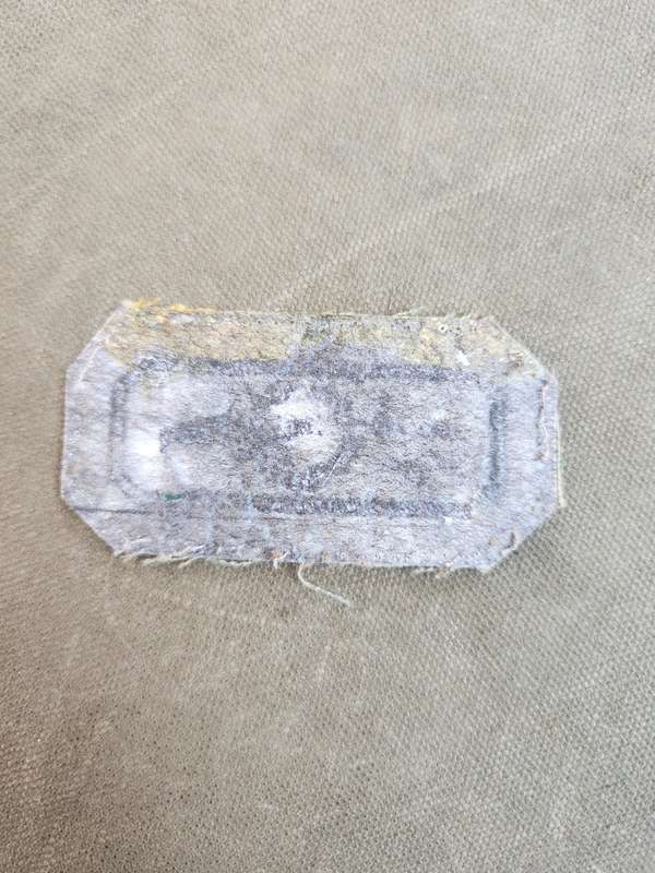 used (removed from uniform) SAP era sniper cloth field-dress badge on SAP 2nd patt camo backing