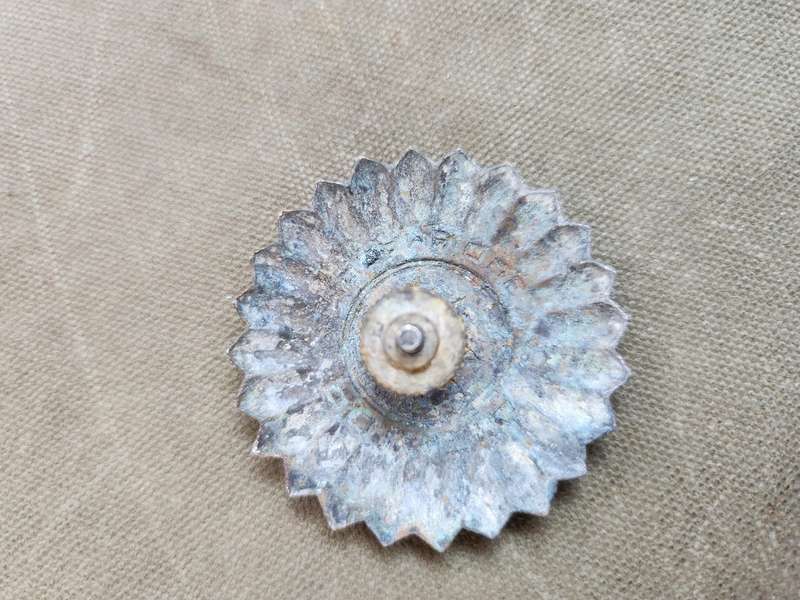 100% original used condition Mozambique PRM (era?) police cap badge with rear screw-post intact
