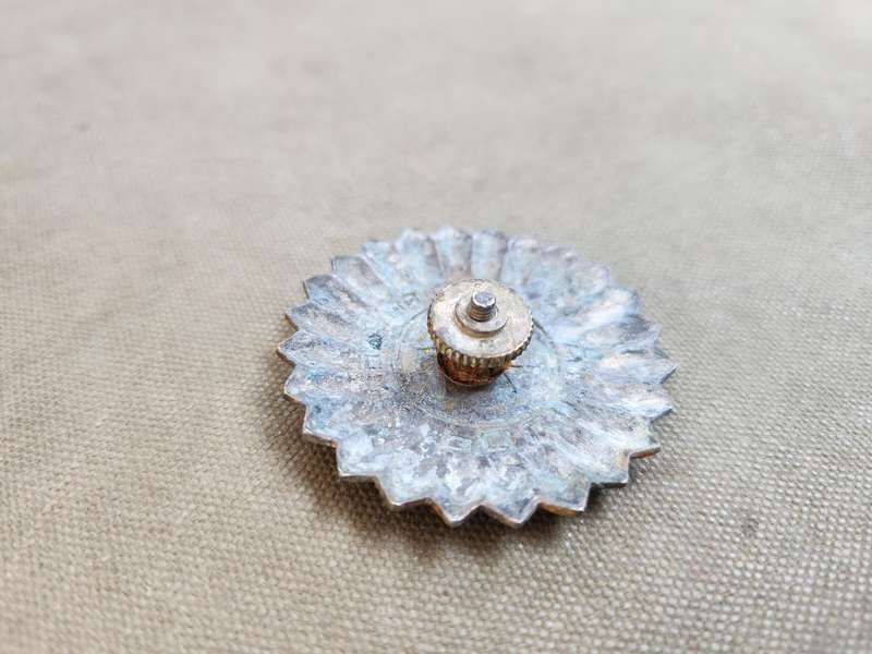 100% original used condition Mozambique PRM (era?) police cap badge with rear screw-post intact