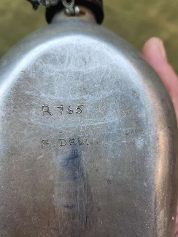 used original US Army dd 1945 canteen and cover with signs of Rhod era custom "baby-poop" camo paint