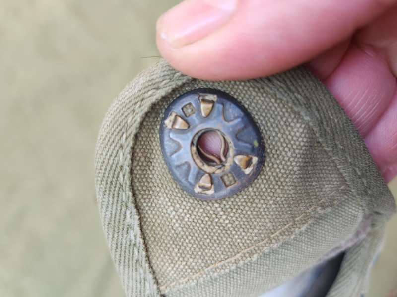 used original US Army dd 1945 canteen and cover with signs of Rhod era custom "baby-poop" camo paint