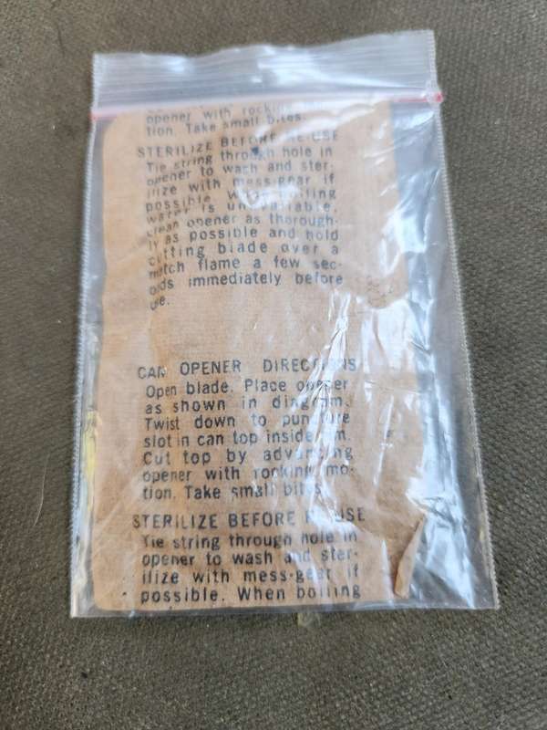 new & unused 100% original USGI type issue (Vietnam period?) p-38 type can opener in original packet