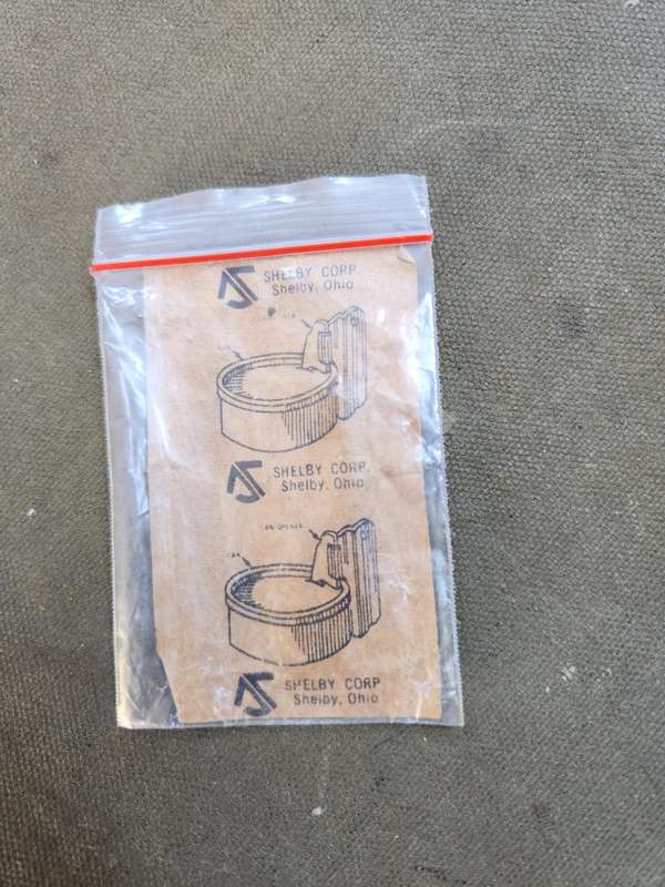 new & unused 100% original USGI type issue (Vietnam period?) p-38 type can opener in original packet