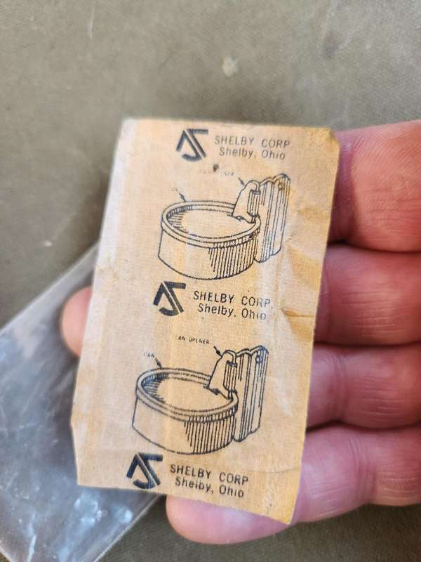 new & unused 100% original USGI type issue (Vietnam period?) p-38 type can opener in original packet