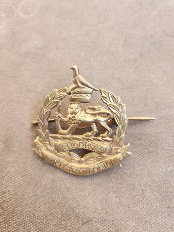 100% original Rhodesia bushwar period metal Military Police cap/beret badge with both rear lugs inta