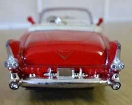 RED 1955 CADILAC ELDORADO USED UNDER LICENCE (1:43 -  NEWRAY MADE IN CHINA)