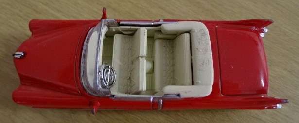 RED 1955 CADILAC ELDORADO USED UNDER LICENCE (1:43 -  NEWRAY MADE IN CHINA)