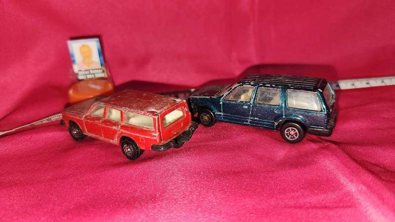 2 x Station Wagons ( Volvo Corgi and Ford Explorer )
