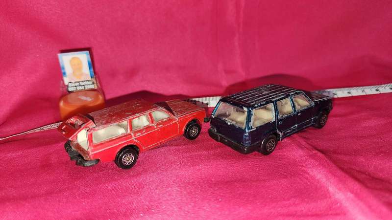 2 x Station Wagons ( Volvo Corgi and Ford Explorer )