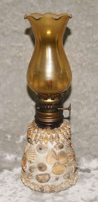 Vintage oil lamp with amber glass flue