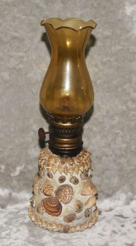 Vintage oil lamp with amber glass flue