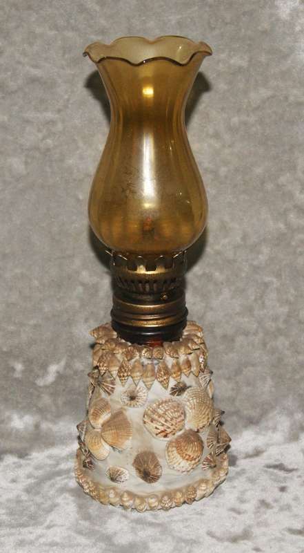 Vintage oil lamp with amber glass flue