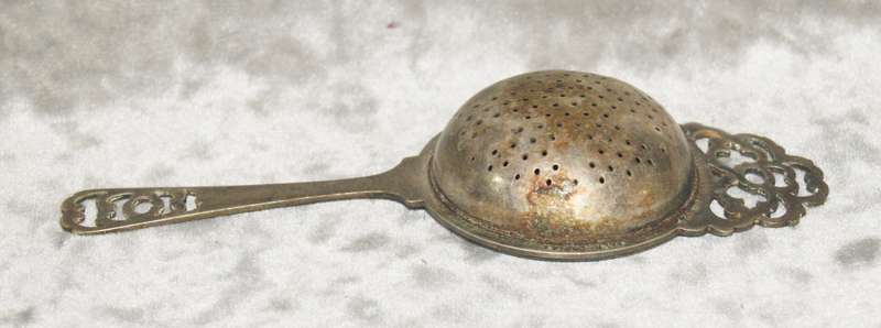 Vintage silver plated tea strainer