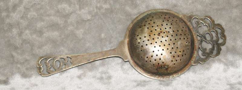 Vintage silver plated tea strainer