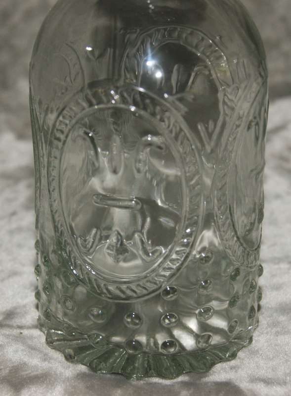 Moulded glass olive oil bottle