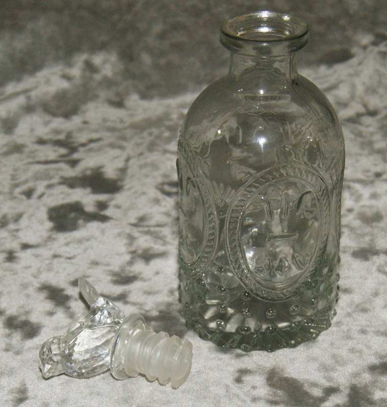 Moulded glass olive oil bottle