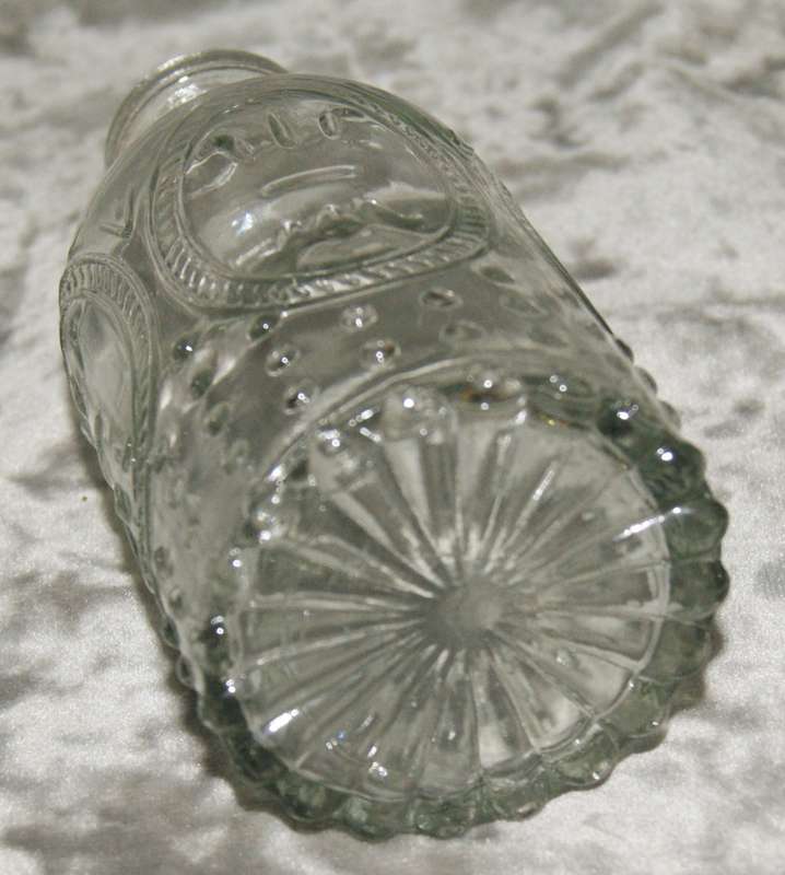 Moulded glass olive oil bottle
