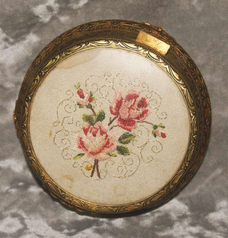 Brass footed high relief trinket box with needlepoint on lid