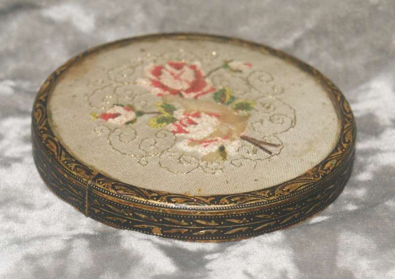 Brass high relief needlepoint lid