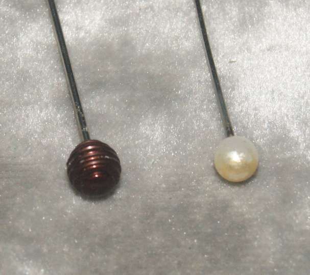 Pair of vintage hat pins