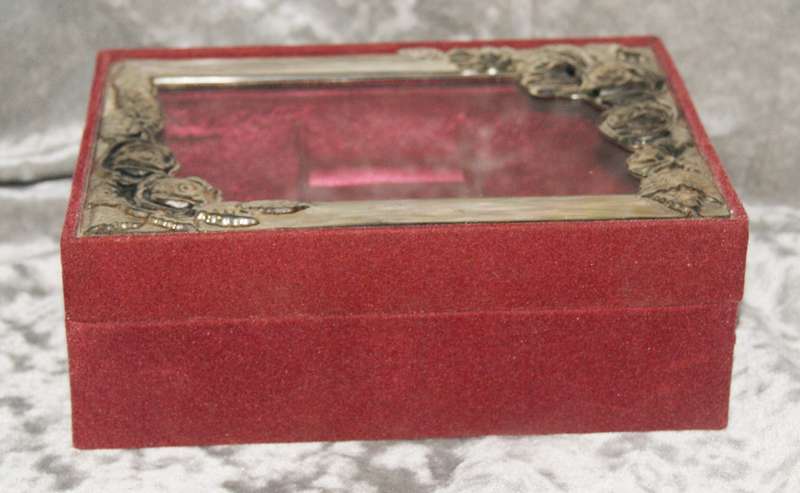 Velvet covered jewellery box with silver plate and glass lid