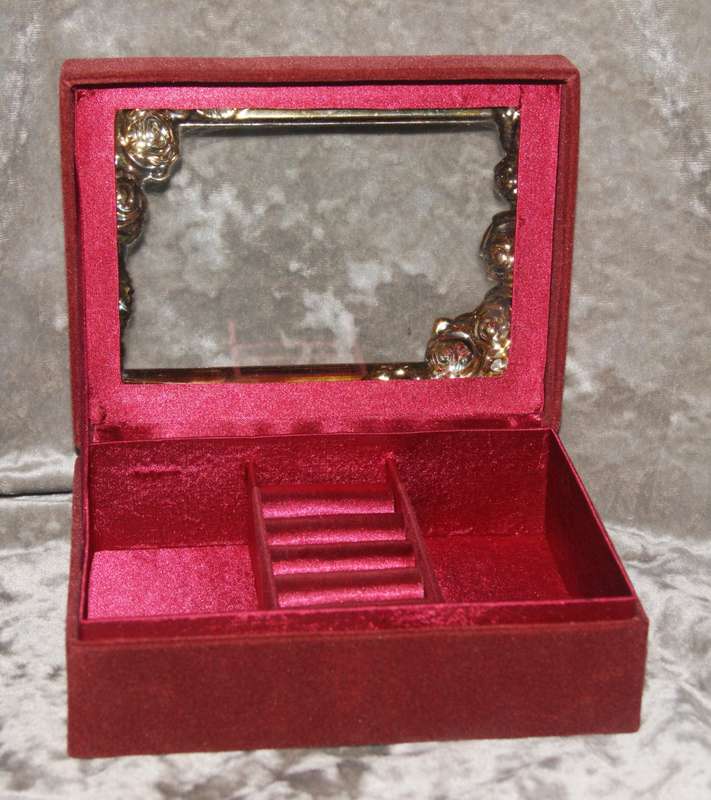 Velvet covered jewellery box with silver plate and glass lid