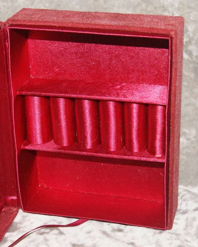 Velvet covered jewellery box with silver plate and glass lid