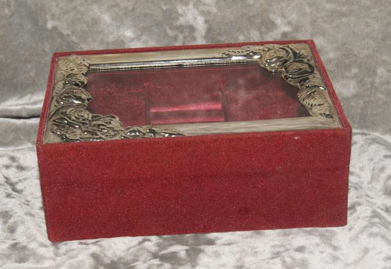 Velvet covered jewellery box with silver plate and glass lid