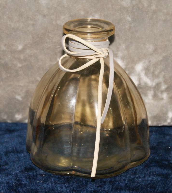 Fluted smokey glass bottle