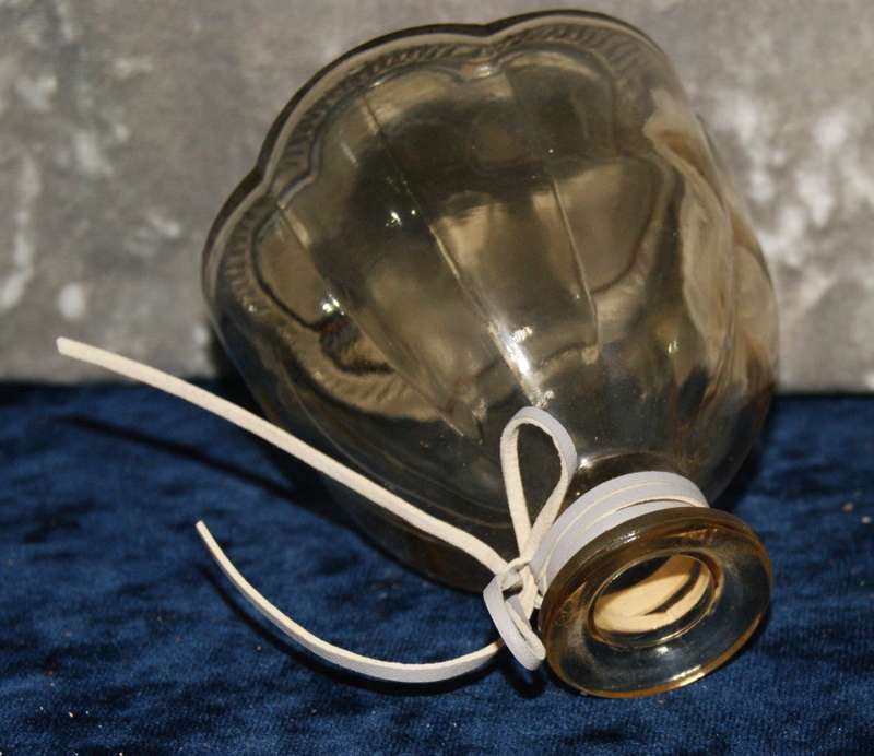 Fluted smokey glass bottle