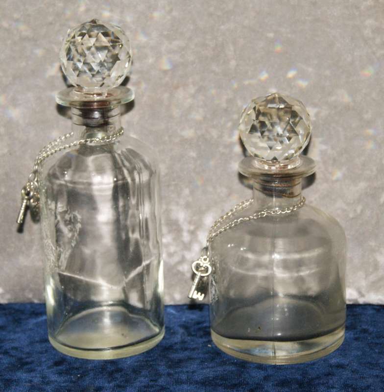2x Vintage rose decanters with crystal stoppers