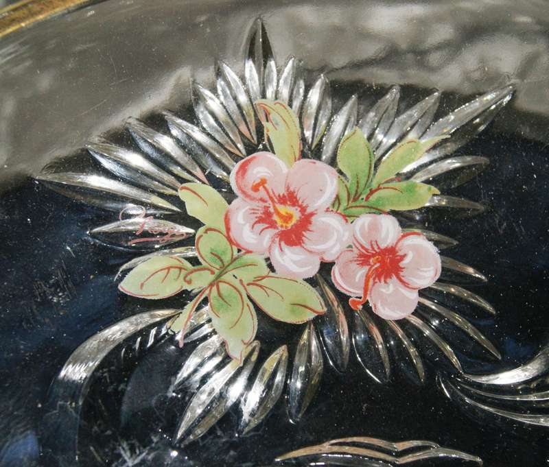 Molded glass pastry serving dish on central column with signed artwork on top