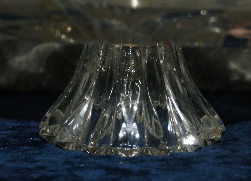 Molded glass pastry serving dish on central column with signed artwork on top