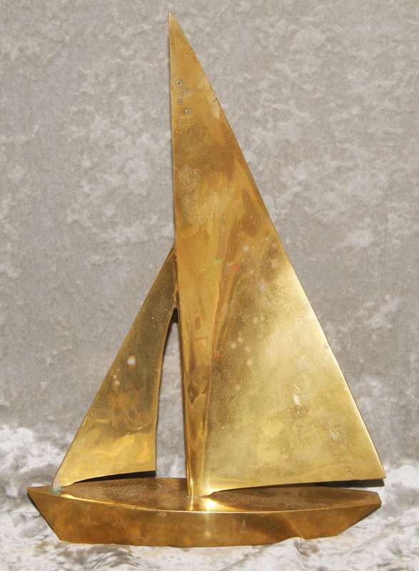Large brass sailing boat (yacht)